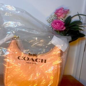 Brand new never been used light peach leather strap shoulder Bag